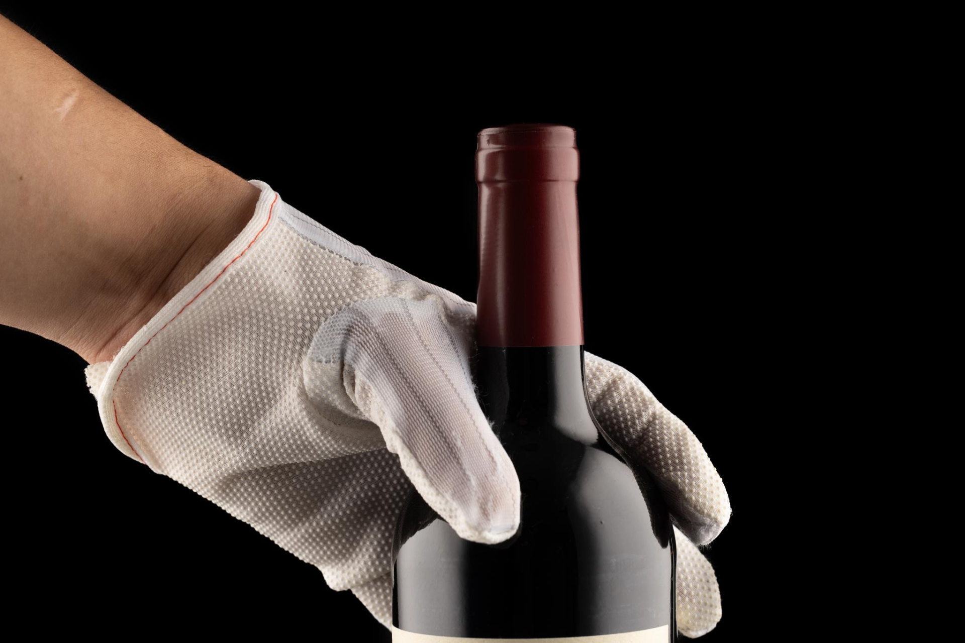 hand-holding-bottle-wine-hand-124729170.jpg