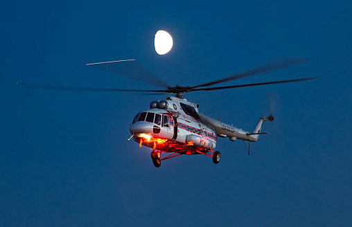 Ночью над Минском кружил вертолет — МЧС показало кадры с воздуха