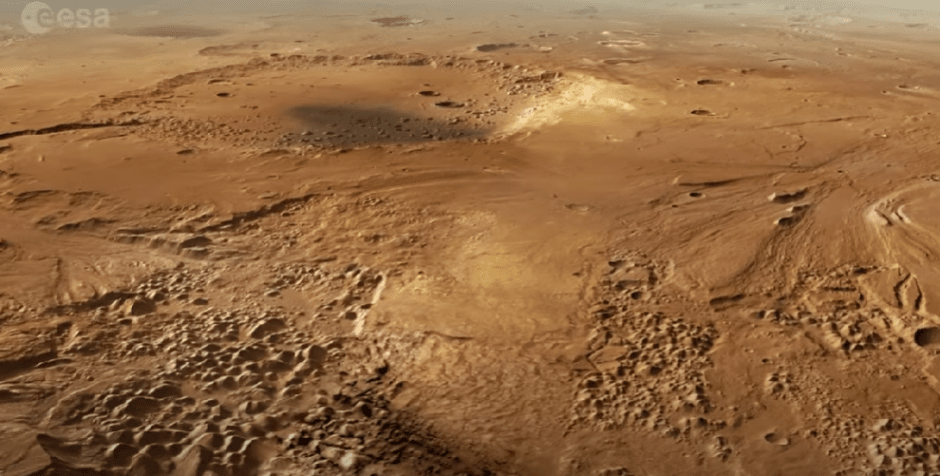 ESA показало полет над древними каналами Марса.png