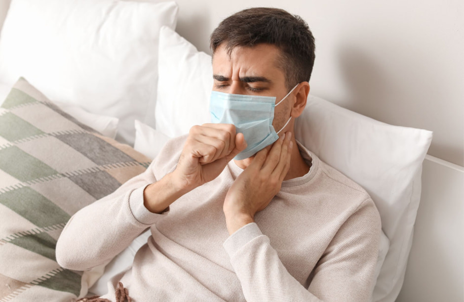 Человек в маске