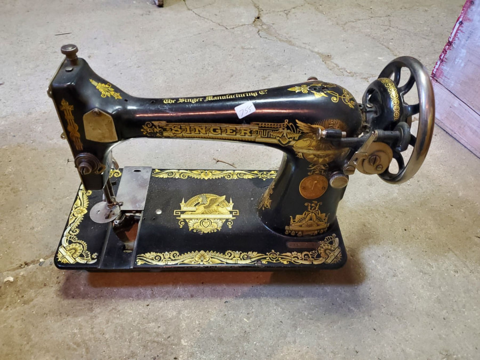 зингер на аукционе